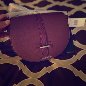 Calvin Klein Crossbody Bag (NWT) and dust bag.
